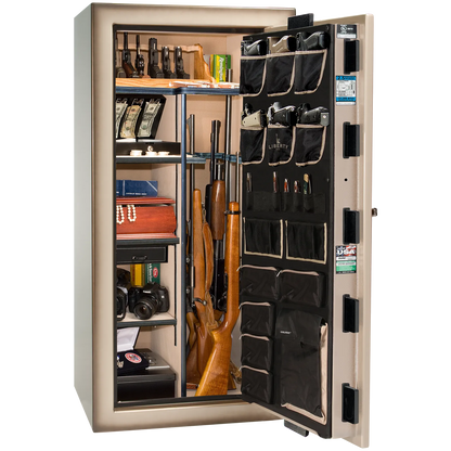 Premium interior of the Liberty Magnum 25 gun safe paired with the Champagne feathered edge finish, featuring adjustable shelving, door organizer, long gun storage, and deluxe interior configuration.