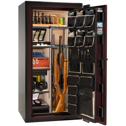 Premium interior of the Liberty Magnum 25 gun safe paired with the Burgundy Metallic feathered edge finish, featuring adjustable shelving, door organizer, long gun storage, and deluxe interior configuration.