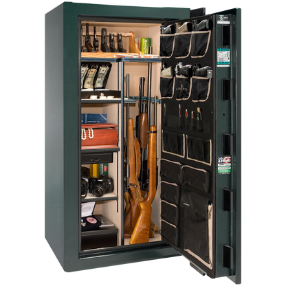 Premium interior of the Liberty Magnum 25 gun safe paired with the Emerald Green gloss finish, featuring adjustable shelving, door organizer, long gun storage, and deluxe interior configuration.