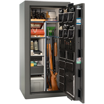 Premium interior of the Liberty Magnum 25 gun safe paired with the Gray marble finish, featuring adjustable shelving, door organizer, long gun storage, and deluxe interior configuration.