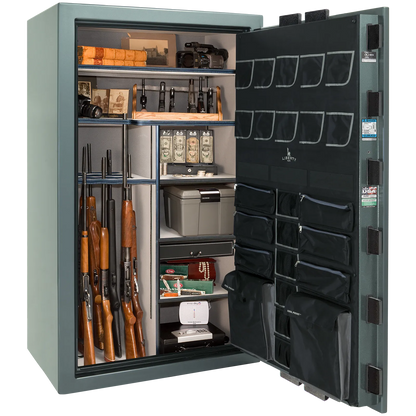Premium interior of the Liberty Magnum 50 gun safe paired with the Forest Mist gloss finish, featuring adjustable shelving, door organizer, long gun storage, and deluxe interior configuration.